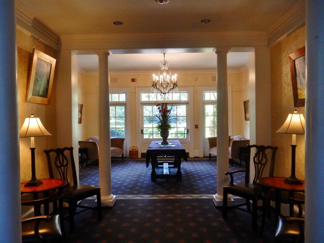 The hall entry to the breakfast room and the gardens.