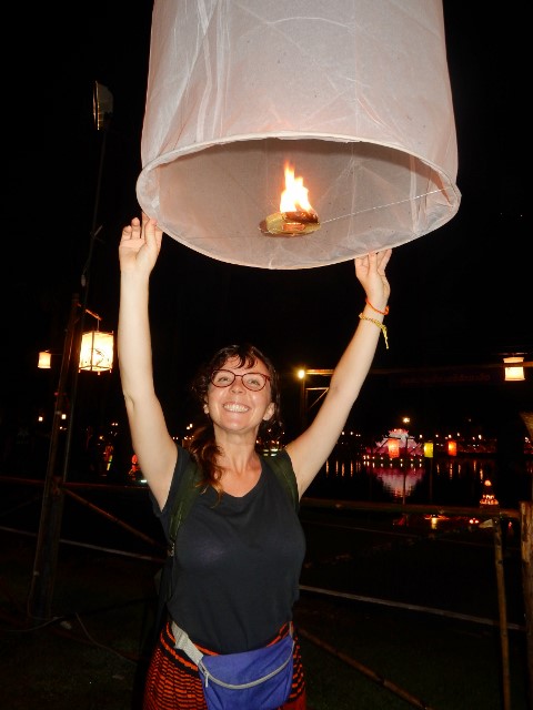 Paper lanterns, called khom loi, fill the sky. 